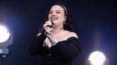 Lola Young surprises Reading Festival with final day set