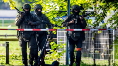Manhunt after shooting at Swiss rave kills woman, 22, and injures five
