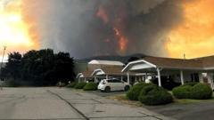 ‘We’ve had a lot of close calls’: Canada wildfire evacuees wonder if they still have homes