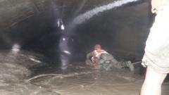 Nepal rescuers try to reach dozens trapped in tunnel after two found alive
