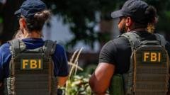 FBI investigates claim by hackers they stole data on all agency staff
