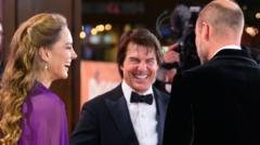 Prince and Princess of Wales share a laugh with Tom Cruise at film premiere