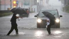 Millions urged to evacuate as powerful Typhoon Dujuan hits Japan
